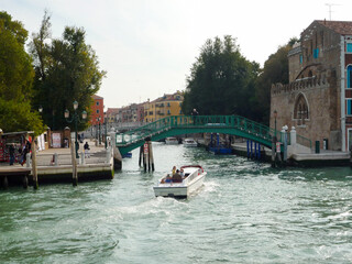 Exploring the beautiful canals with river taxis in Venice, Italy.