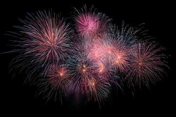 Obraz premium Fireworks burst in a vibrant display of color against a black night sky
