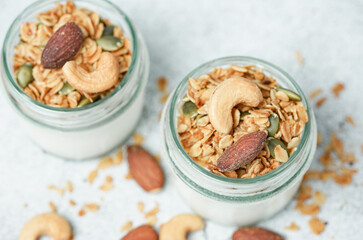 Top view of Homemade healthy breakfast, bowl with greek yogurt and granola.