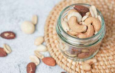 Top view of Healthy mix nuts in a bowl. Almonds, hazelnuts, cashews, peanuts and pistachios. 