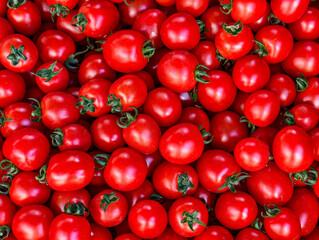Fresh Cherry Tomatoes Piled Together in Vibrant Red. High-Resolution Image Perfect for Wallpapers, Marketing, Social Media, and Culinary Projects. Natural Background 