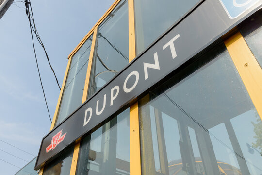 oblique angle view of sign outside subway entrance pavilion at Dupont station of Line 1, 265 Dupont St, Toronto