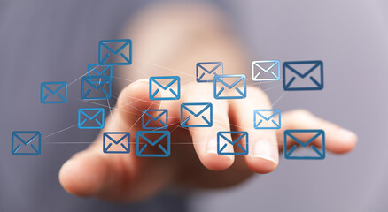 Hand interacting with a network of email icons, representing global communication and connectivity.