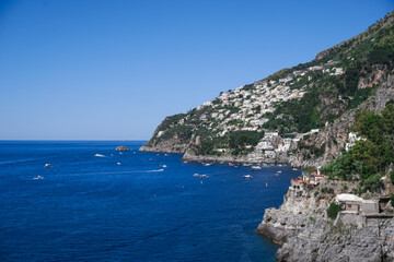 Breathtaking Cliffside Village Overlooking the Mediterranean Sea with Colorful Houses and Rugged Coastal Landscape