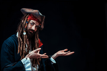 Pirate Making a presenting, Confused or Questioning Gesture in Studio Portrait on Black Background
