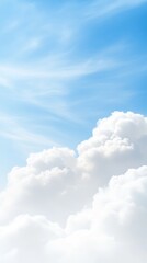 A breathtaking expanse of serene blue sky adorned with soft, fluffy white clouds