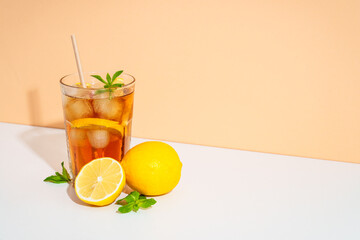Summer cold drink on colored background with hard shadows.