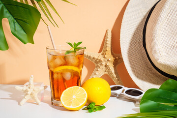 Summer cold drink on colored background with hard shadows.