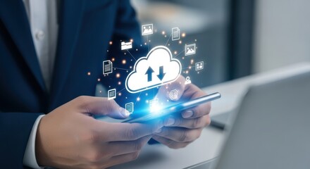 Businessman using smartphone with glowing cloud technology and digital data icons symbolizing connectivity and information transfer