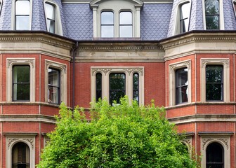 Naklejka premium Architectural detail of an elegant red-brick Victorian townhouse in Boston, Massachusetts, USA 