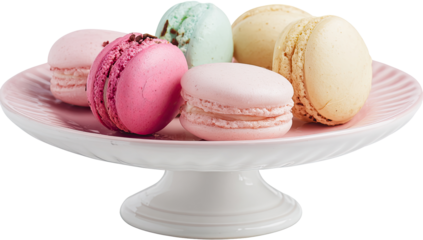 Delicate macarons in pastel hues arranged on a tiered dessert plate