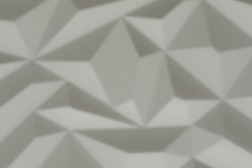 High-resolution stock photo of an abstract geometric pattern created by shadows on a white surface. Perfect for backgrou
