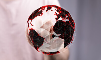 Futuristic digital globe in hand, representing global network, technology, innovation, and connection.