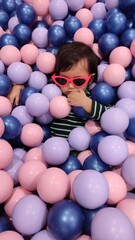 little girl with balloons