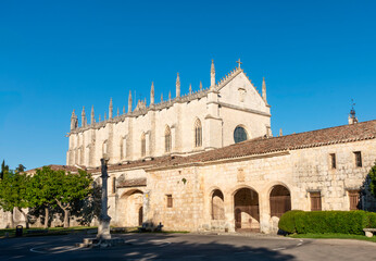 Fototapeta premium The Isabelline Gothic Monastery of Cartuja de Miraflores in Burgos, Spain, on a sunny day.