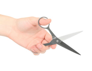 hand holding scissors