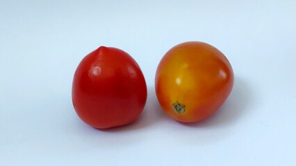 Tomato isolated. Tomato on white background. Healthy tomatoes ready to eat