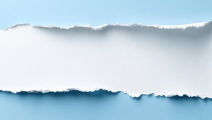 Fototapeta premium Ripped white paper on a light blue background