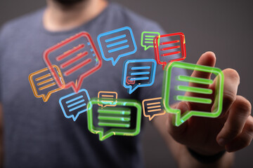 Abstract image of a person interacting with colorful chat bubbles, representing communication and digital interaction.