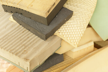 Pile of used foam mattress padding and blocks.  Ideal for industrial or recycling concepts.