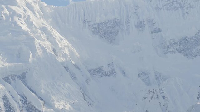 A breathtaking aerial view of snow-covered mountains in Pakistan, highlighting the majestic beauty of its natural landscapes