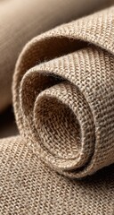 Rolled light beige fabric texture close-up
