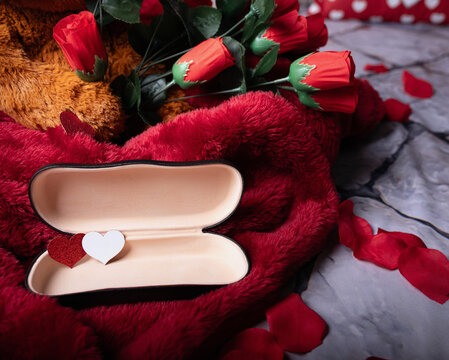 Open Contact Lens Case with Red Hearts. Valentine's Day Eye Care Concept