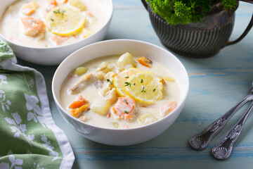 Thick soup chowder made with salmon, white fish, shrimps and vegetables