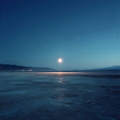 Serene Moonlit Landscape Over Calm Water with Tranquil Atmosphere