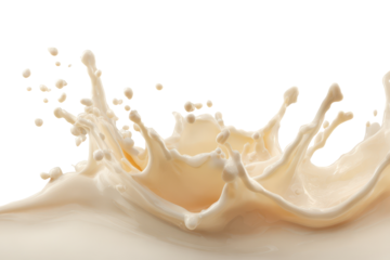 Creamy liquid splashing against a white backdrop in a dynamic and vibrant display of movement and texture at a close range