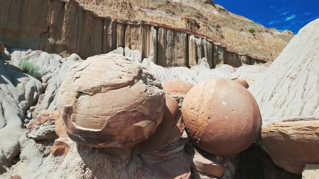 A vibrant and colorful view captures the unique Cannonball concretions in the North Unit of Theodore Roosevelt National Park
