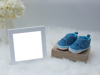 Baby blue shoes with white photo picture transparent frame on a dreamy fluffy soft fur rug with cream white hydrangea flower blossom. Customize with your own photo image or video. 

