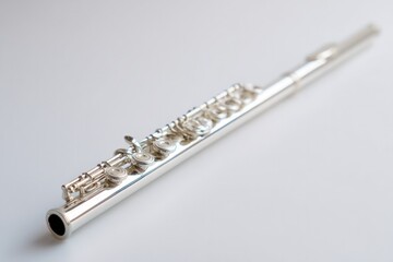 Obraz premium Shiny flute elegantly positioned, showcasing intricate key desig