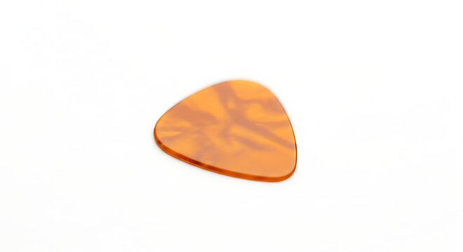 Isolated orange guitar pick on a white background perfect for musical instrument accessory close up view ai generated