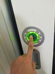 hand with switch on wall