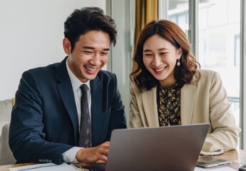 Obraz premium Dynamic Meeting of Young Asian Professionals in a Bright Modern Office Collaborative Environment