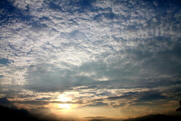 Clouds, Hills  Crimson Skies: Nepal’s Sunset Symphony