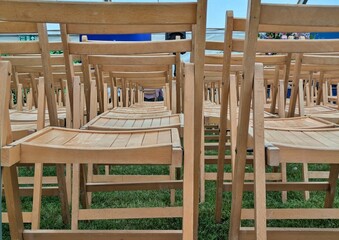 Empty chairs in a marquee
