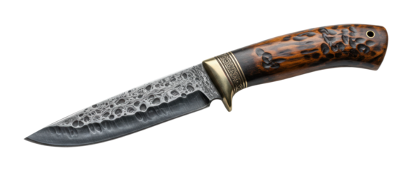 Ornate damascus steel hunting knife with intricate wood handle design. Cut out PNG