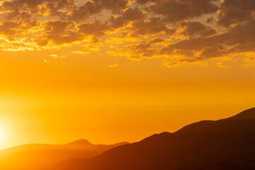 Fototapeta premium Sunset and sunrise views from Concord Brentwood Hillside East tower in Burnaby, BC, Canada