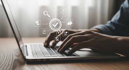 Person Using Laptop for Task Management and Workflow Approval with Checkmark Icon Overlayed on Screen  Business Technology Stock Photo