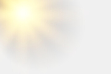 Glowing sunburst light effect. Soft golden flare with radial blur. Bright sunlight halo on white background.