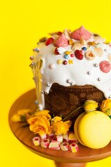 Traditional Easter cakes (kulich) with glaze, nuts, and dried fruits. Rustic still lifes with milk, eggs, willow branches, gift boxes, and festive decorations for Orthodox Easter celebration.