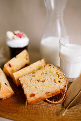 Traditional Easter cakes (kulich) with glaze, nuts, and dried fruits. Rustic still lifes with milk, eggs, willow branches, gift boxes, and festive decorations for Orthodox Easter celebration.
(198 сим