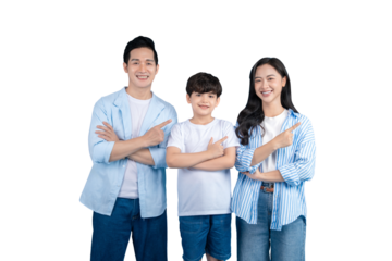 A happy asian family of three pointing their fingers in the same direction, smiling together. The father, son, and mother all wearing light blue and white clothes on a white background