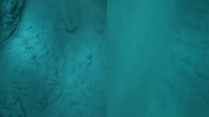Deep teal, swirling patterns, abstract texture.
