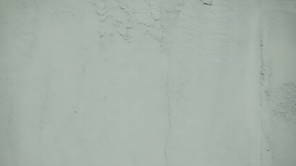 A plain, light gray textured surface.
