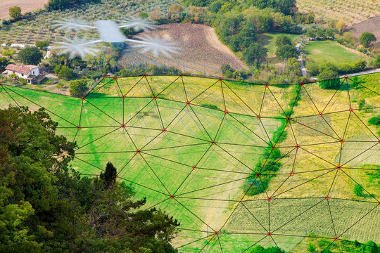 DRONE SURVEYING A FLAT AGRICULTURAL FIELD WITH DIGITAL LASER GRID FOR TOPOGRAPHIC MAPPING and precision agriculture applications