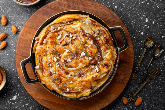 Phyllo pastry pie with pear, gorgonzola cheese, almond and honey, top view