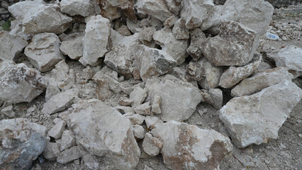 Close-up of light, crushed limestone. Macro texture solid rock.